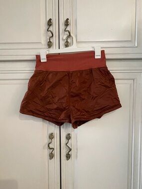 FP Movement by Free People Rust High-Rise Athletic Shorts with pockets